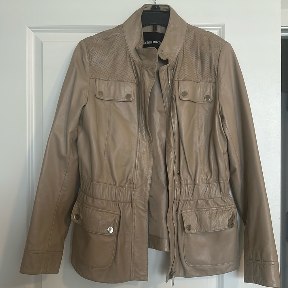 Beige women’s 100% leather jacket.